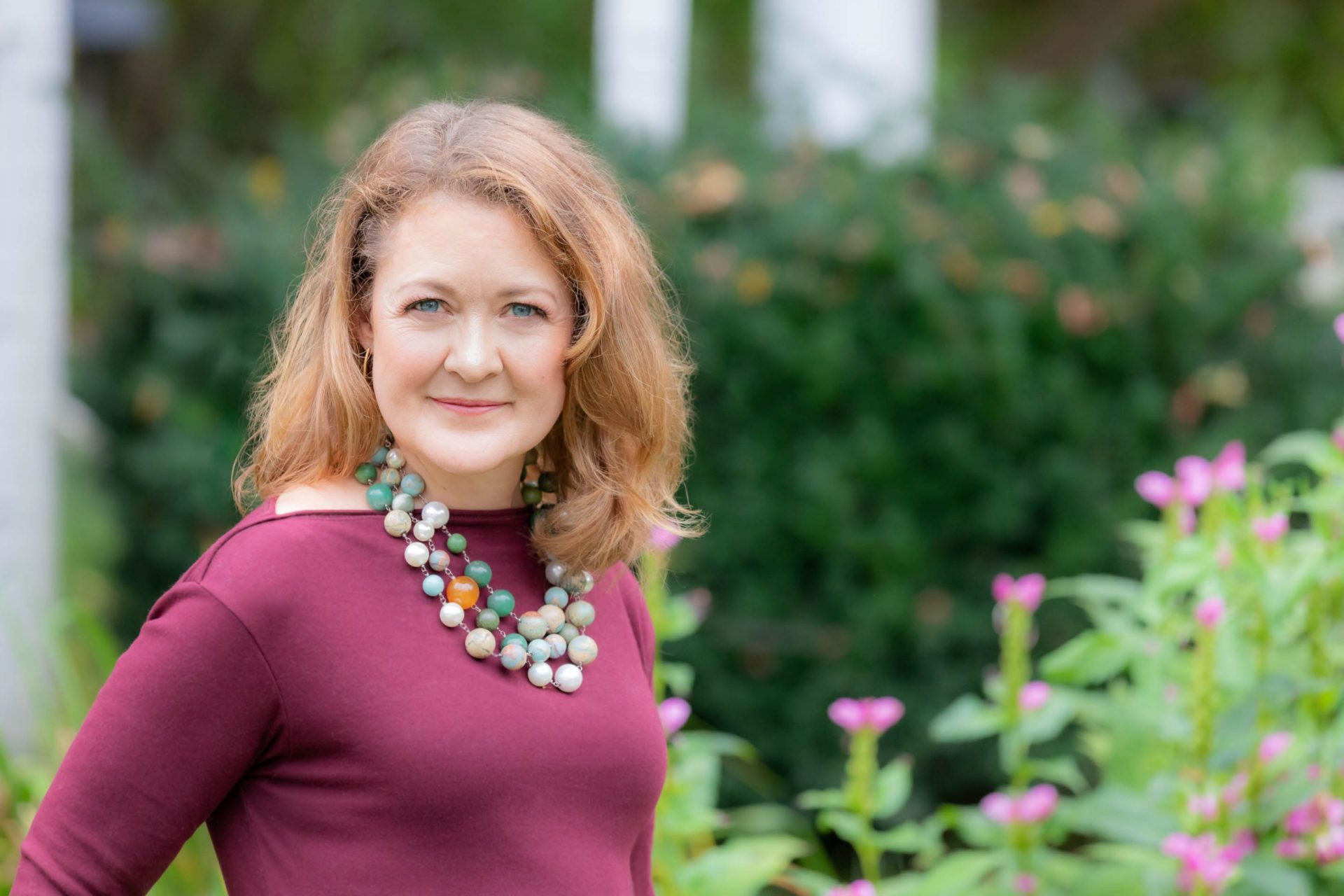 Christine Schlangen in flower garden